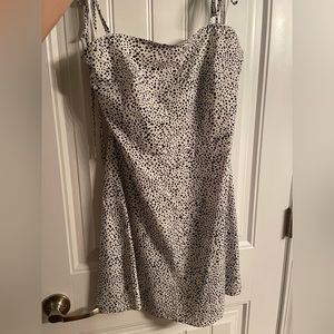 White sundress with black polka dots